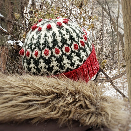 A festive hat in red, green, and white.